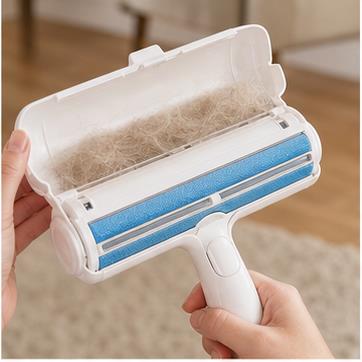 Manual reusable pet hair cleanup tool with hair chamber